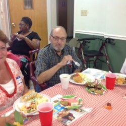 Doc and Dawn Olinger enjoy the monthly meal with a friend